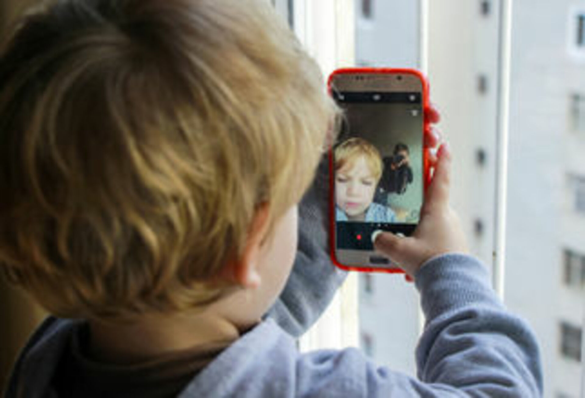 Behind the Lens: People Taking Photos and Videos example photo