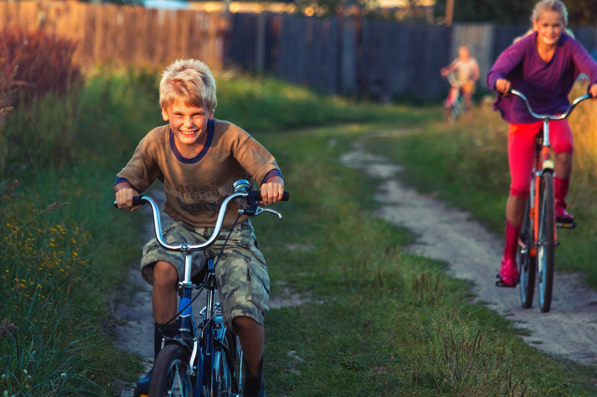 Cycling week: Kids riding on bicycles example photo